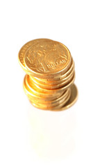 Australian one dollar coins, isolated on white.  