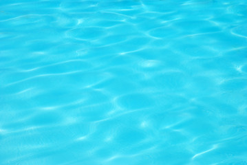 Fototapeta na wymiar Niebieski tropikalna tła wody w basenie