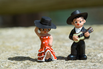 Guitarist and a Spanish dancer doll
