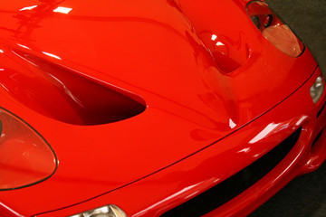 red supercar hood