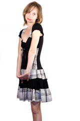 Shy woman in pretty dress staring at you with smile