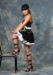 Fototapeta premium Beautiful Brunette Girl with in black dress