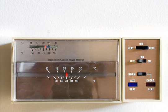An indoor thermostat control for heating and air conditioning.