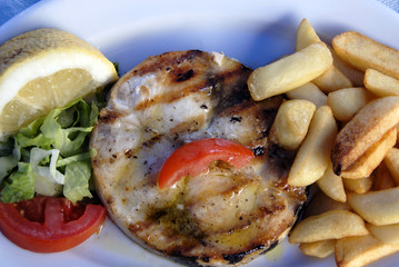 Greek meal with swordfish