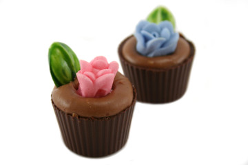 Delightful and colorful handmade flowerpot chocolates.