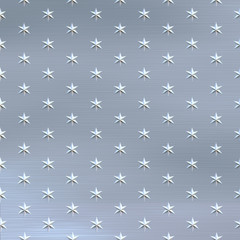 a large sheet of brushed metal with stars embedded on it