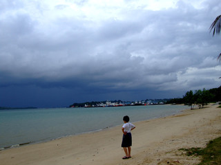 boy stand at the seasides
