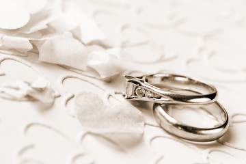 engagement ring and wedding ring, toned sepia