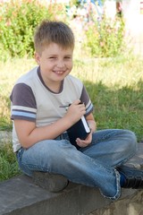 Naklejka na ściany i meble boy with book