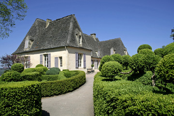 traditional old house in landscaped gardens, marqueyssac, france