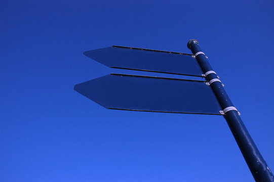 Empty sign and blue sky