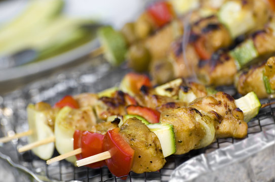 chicken meat with vegetables on stick griled on barbecue 