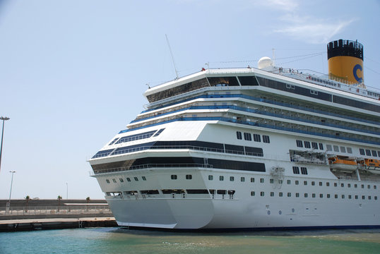 pictures of a cruise ship docked at the harbor