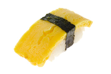 Japanese food - Tamago nigiri isolated on white background..