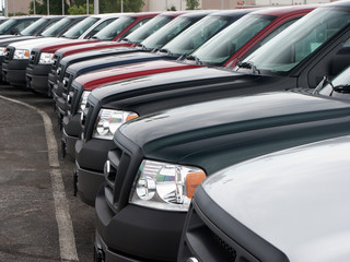 Front of trucks in new car lot