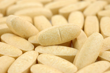 Fototapeta na wymiar Close up of vitamin pills