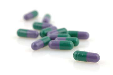 Green and grey capsules