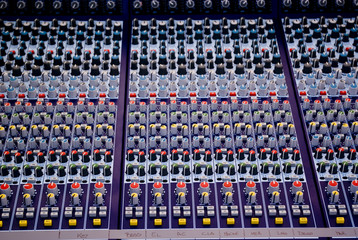 Color buttons and controls on audio mixing console