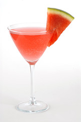 Watermelon martini with slice of watermelon on white background