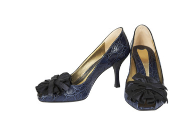 Leather shoes with a bow on a white background