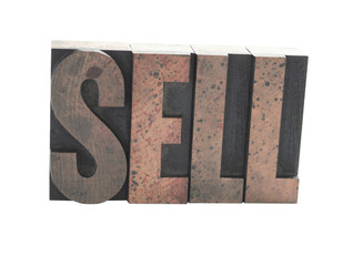 the word 'SELL' in old wood letters