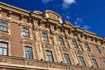 Brown historic building in Saint-Petersburg in summer, Russia