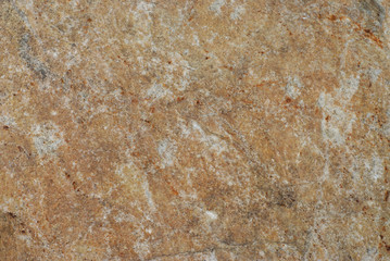Obraz na płótnie Canvas Fragment of weathered stone surface