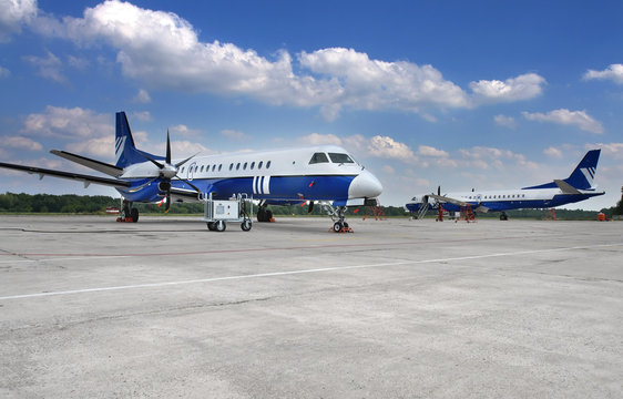 Buisness class airplanes at airport. 