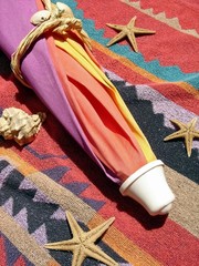 parasol et étoiles de mer