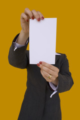 businesswoman showing a blank card (focus on the card)