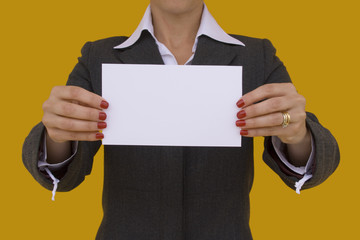 businesswoman showing a blank card (focus on the card)