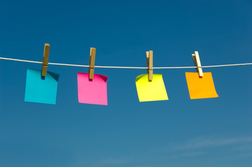 Four Sticky notes on a clothesline