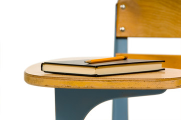 Closeup of school desk with book