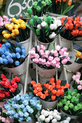 wooden tulips in market in amsterdam-.summer in amsterdam