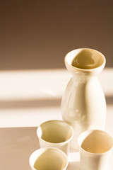 Sake jug and cups with copy space