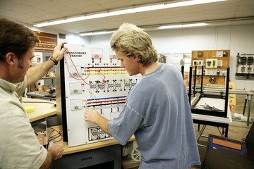 An adult education student learning about transformers.