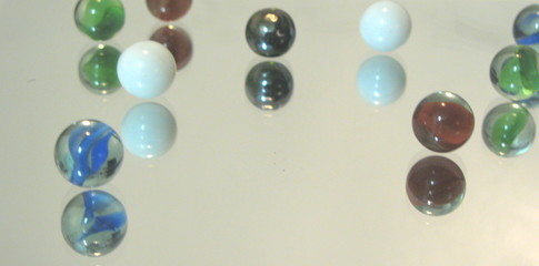 Marbles on a Mirror
