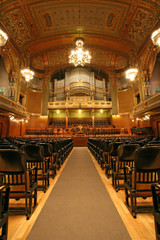 old auditorium with organ, gold and velvet 