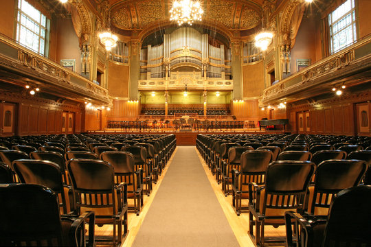 old auditorium with organ, gold and velvet 