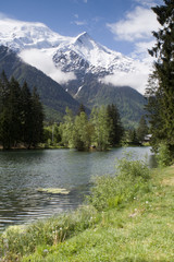 View of Mont Blanc mountain range reflected in lake