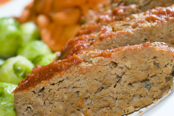 meat loaf brussels sprouts and carrots dinner plate