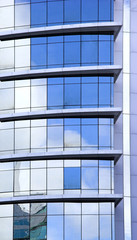 Obraz premium Picture of a Futuristic glass building with reflections