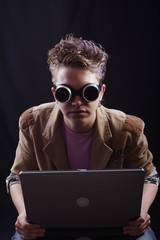 Portrait of a teens(hacker, student). Shot in studio..