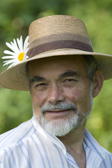 senior with ox-eye daisy