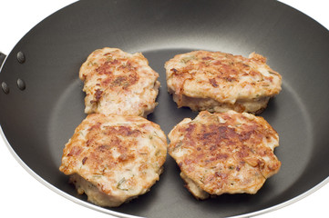 series object on white food - chiken fritters