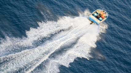 speeding motor boat