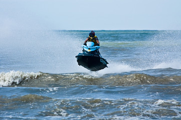 extreme  jet-ski watersports with big waves