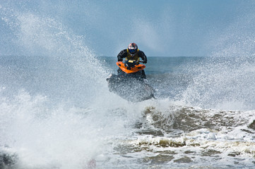 extreme  jet-ski watersports with big waves