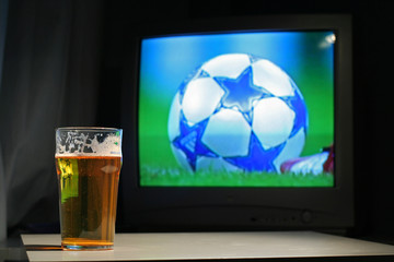 Lager and football on the TV