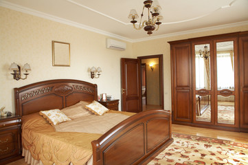Bedroom with the conditioner in modern hotel